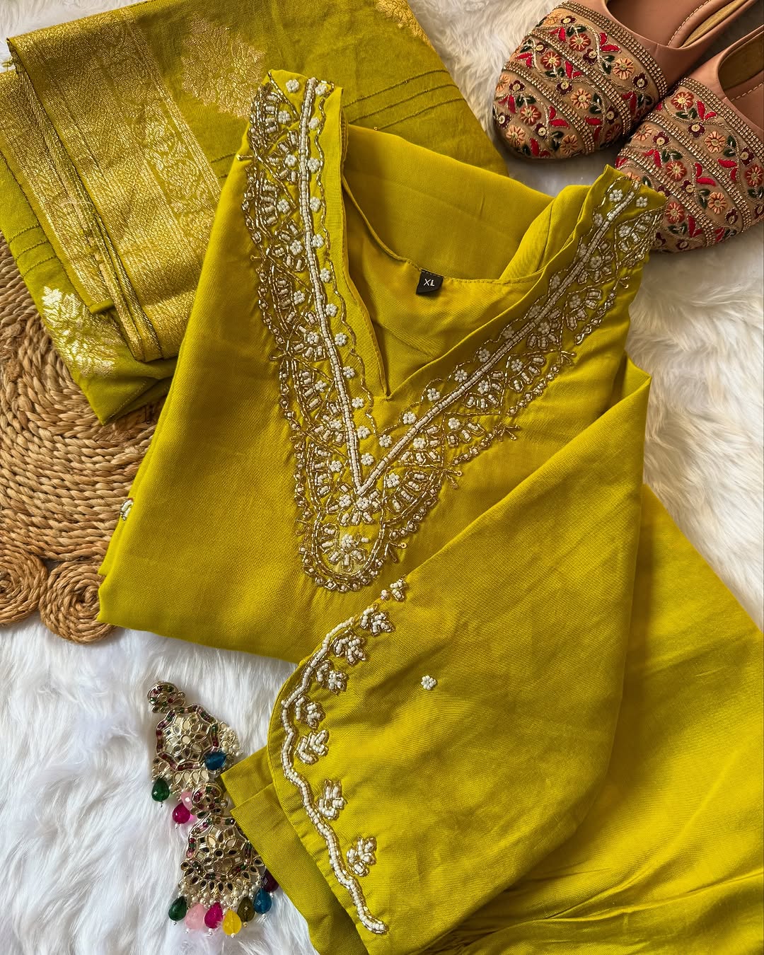 MD-196 "Radiate elegance in this rich suit set, featuring delicate mirror work on the neckline, subtle embroidery on the kurta, and a beautifully woven dupatta β perfect for festive charm and graceful gatherings."
