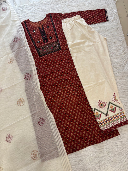 MD-274 "Traditional charm meets modern comfort. 🌟 Loving the details on this printed kurta and crisp off-white coordinates—perfect for daywear or festive gatherings!"