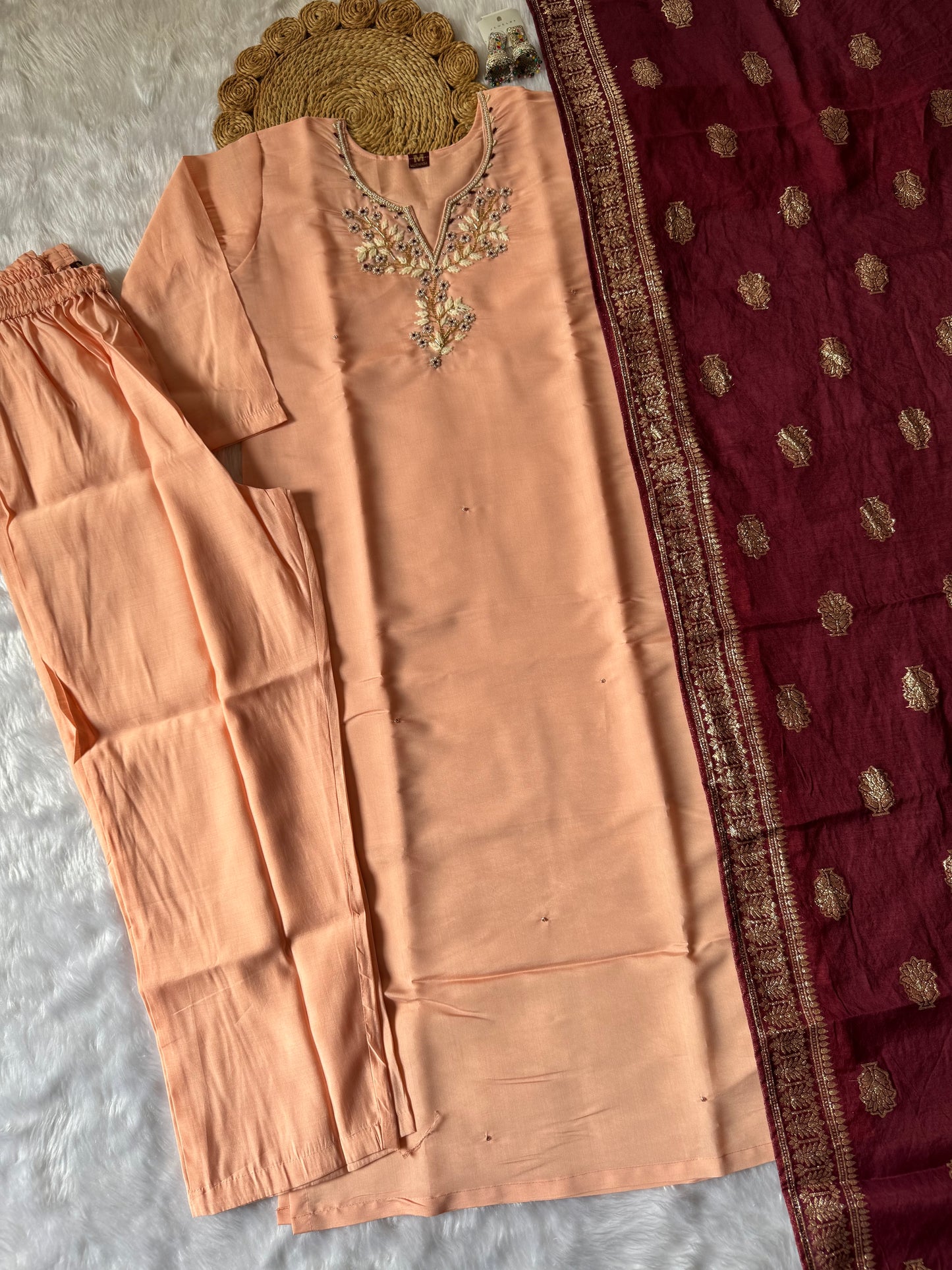MD-175 Peach elegance meets royal charm ✨
A beautifully embroidered kurta paired with a rich maroon dupatta—perfect for festive grace and timeless style.
