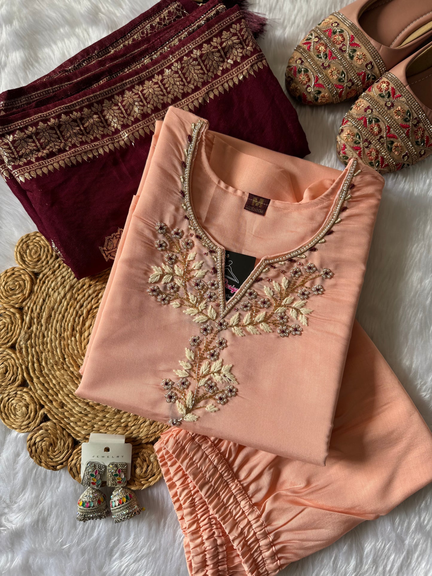 MD-175 Peach elegance meets royal charm ✨
A beautifully embroidered kurta paired with a rich maroon dupatta—perfect for festive grace and timeless style.
