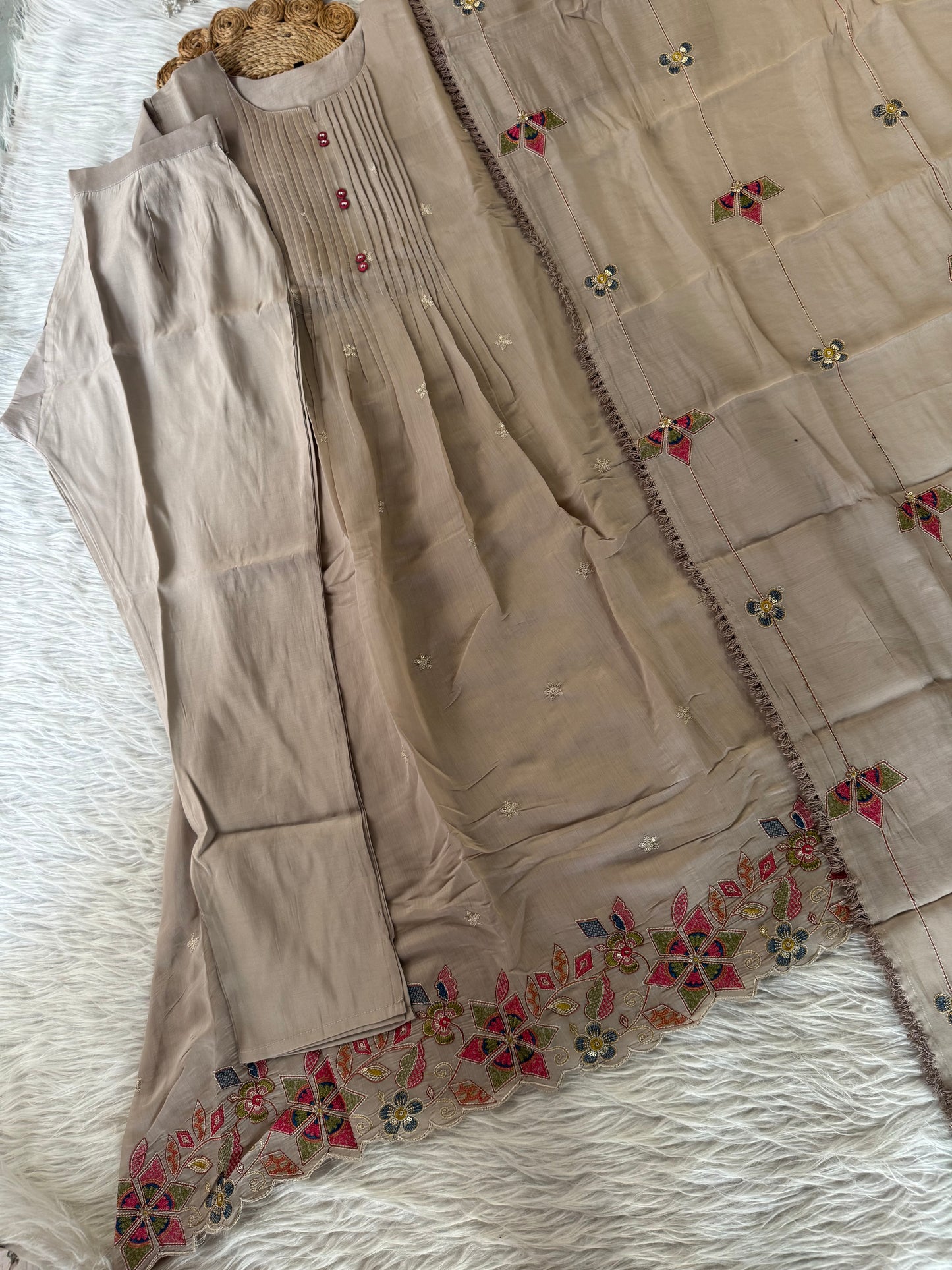 MD-197
"Embrace elegance in every thread – this ensemble features delicate pintucks, floral embroidery, and a beautifully detailed dupatta, making it perfect for festive grace and everyday charm."