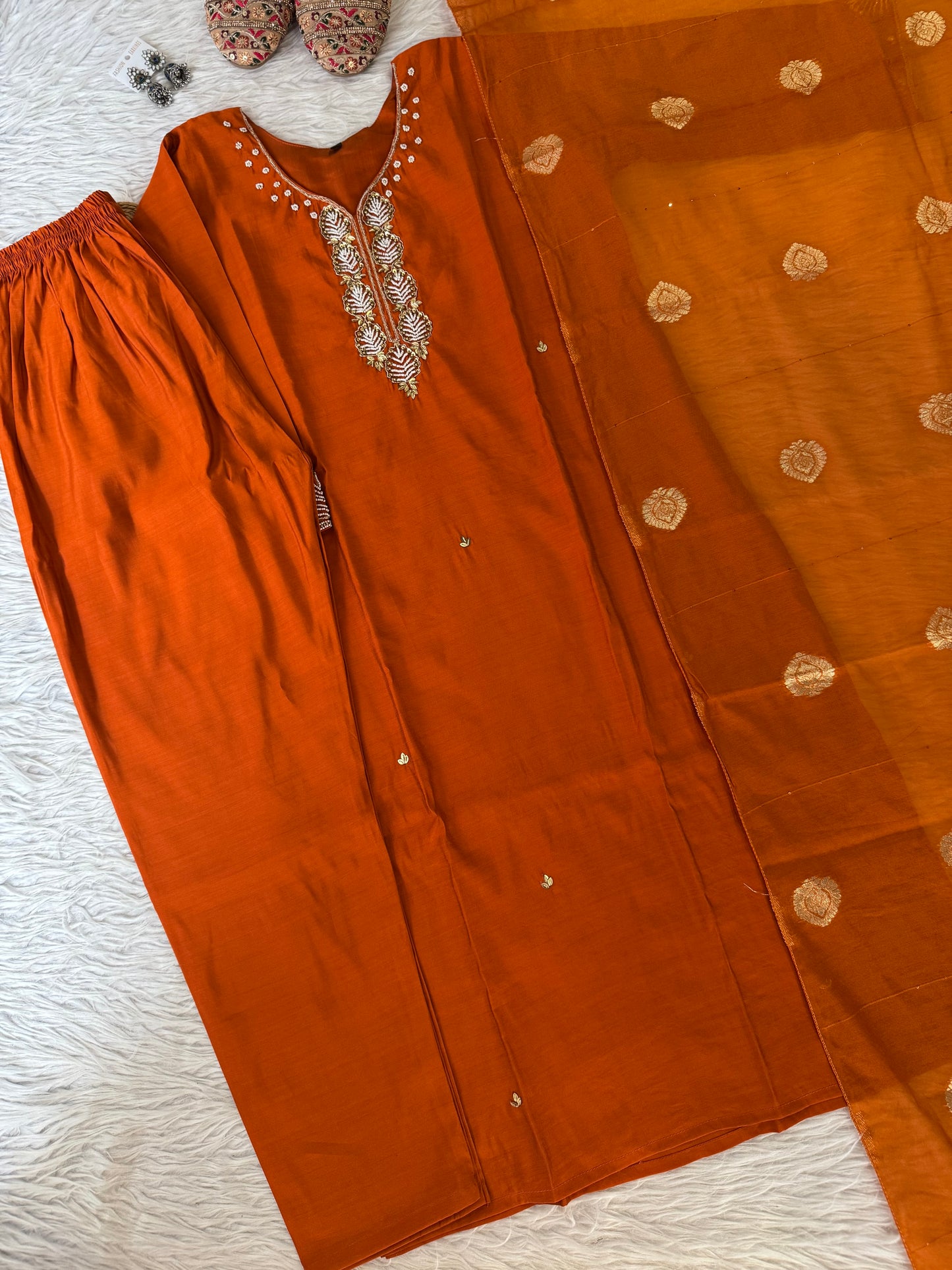MD-210 Elegance in every thread 🌿✨
This rust-orange set with delicate embroidery and a touch of tradition is perfect for festive charm and everyday grace. Pair it with juttis and silver jewels for that timeless ethnic vibe. 🧡
#FestiveStyle #EthnicElegan