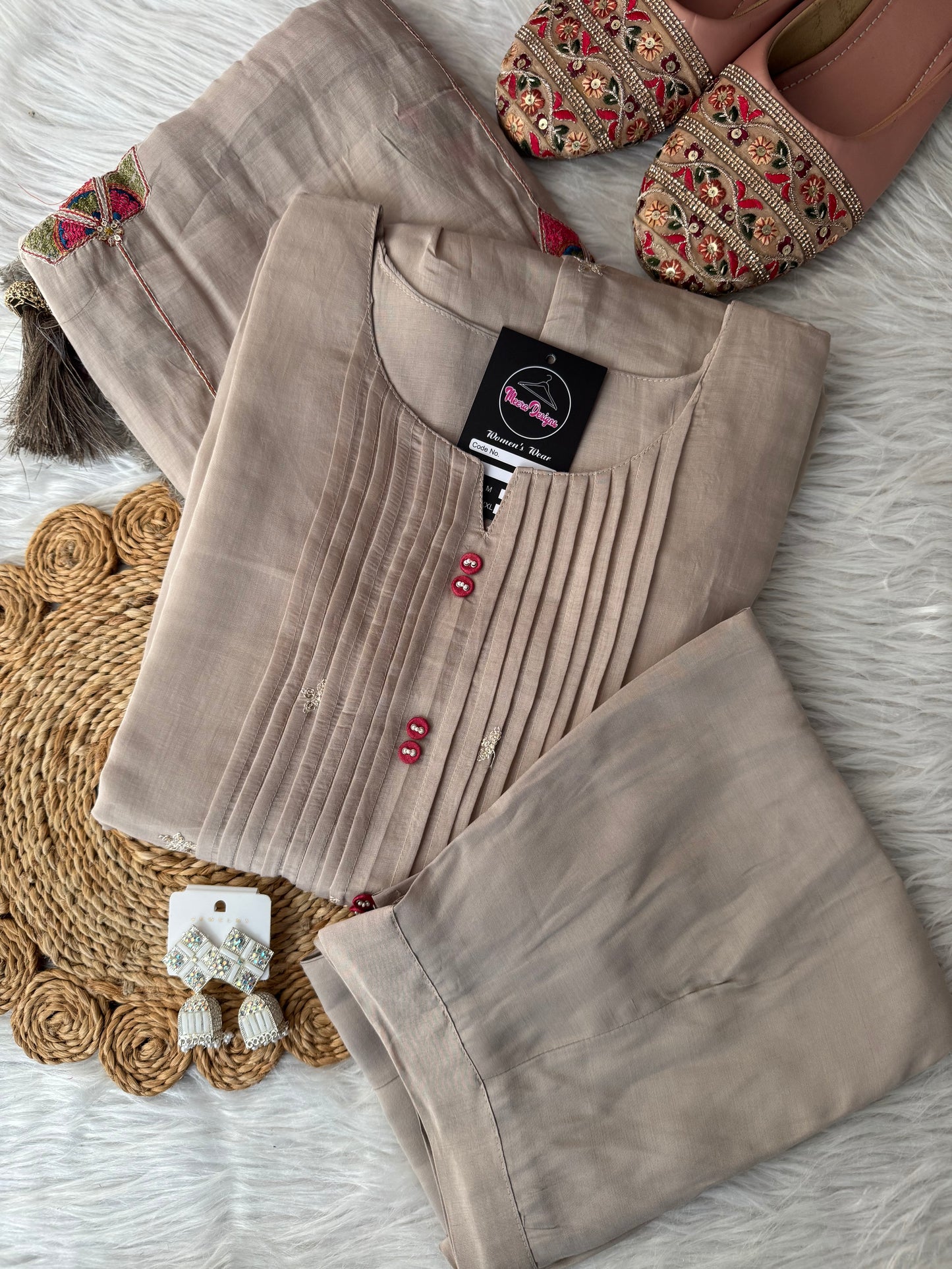MD-197
"Embrace elegance in every thread – this ensemble features delicate pintucks, floral embroidery, and a beautifully detailed dupatta, making it perfect for festive grace and everyday charm."