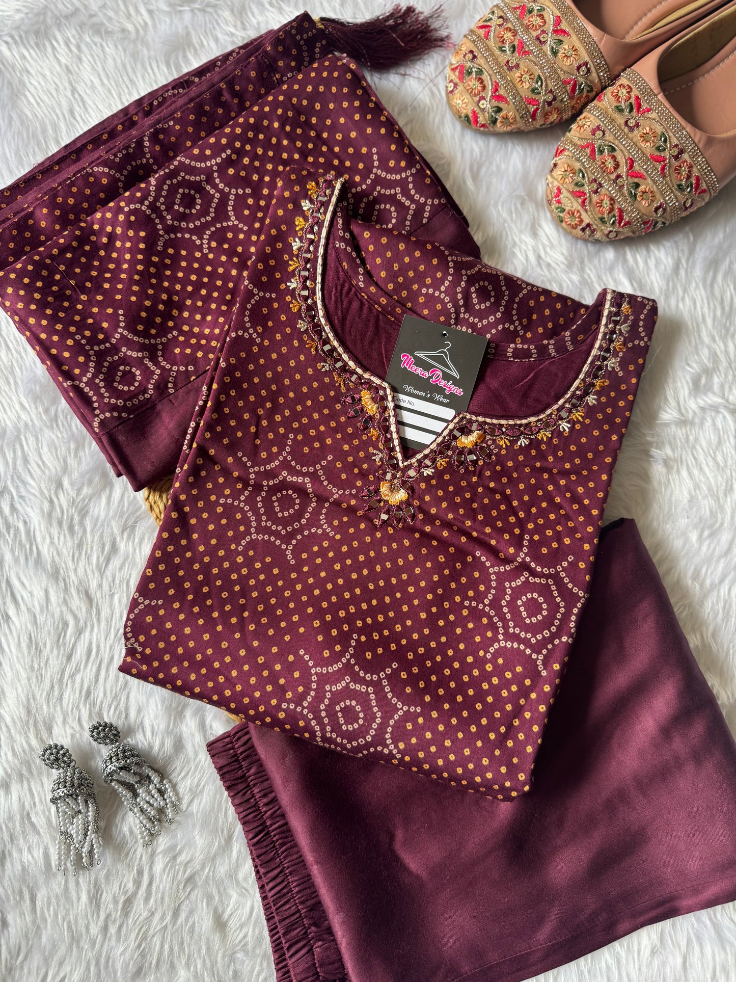 MD-179 This deep Wine Bandhani suit set blends traditional patterns with subtle embellishments, perfect for a timeless ethnic charm."