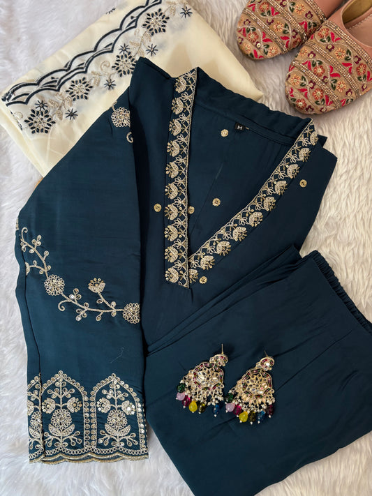 MD-213 "Elegance in every detail with embroidary work β¨ This deep purple suit with delicate floral embroidery is a perfect blend of grace and tradition