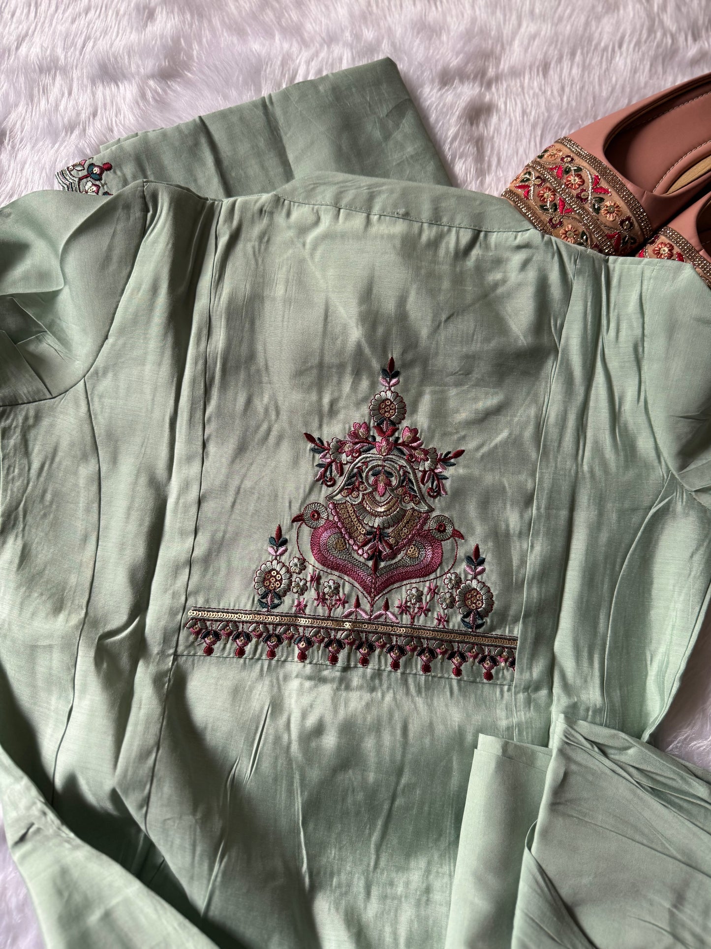 MD-188 A soft kurta set adorned with intricate thread embroidery and a delicately detailed dupatta. Perfect for effortless elegance in every season. ✨