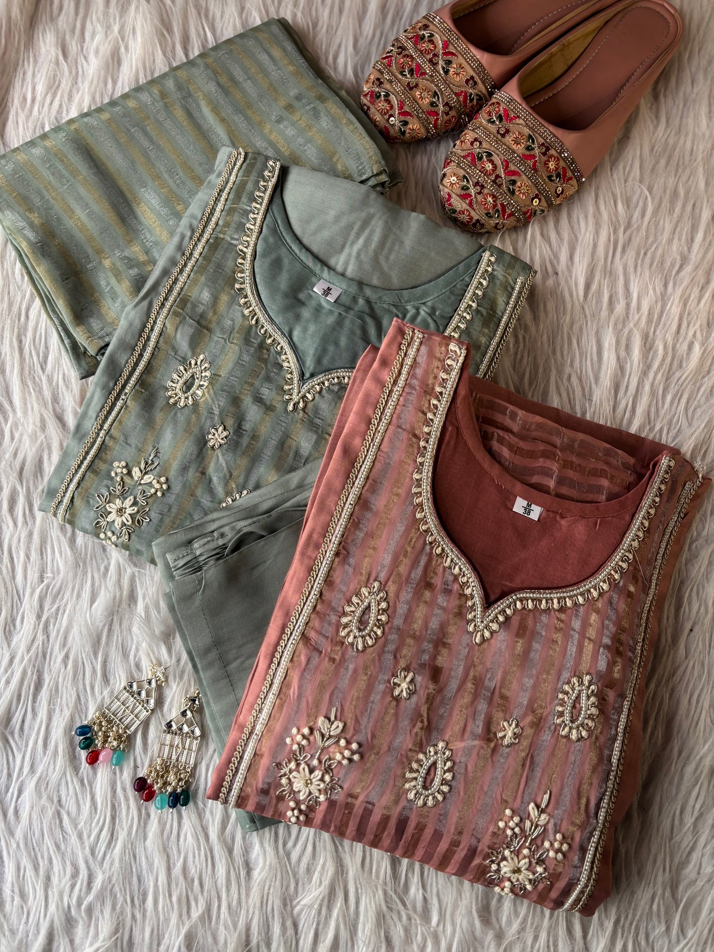 MD-228 That is a lovely choice! This ethnic set has a very sophisticated, calming vibe. Depending on where you’re posting this, here are a few caption options for you: