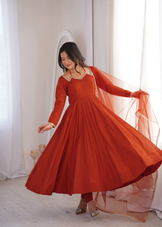 MD-243 That is a stunning ensemble! The rich burnt is incredibly vibrant and perfect for a festive occasion.
Here are a few caption options depending on the "vibe" you want for your post: