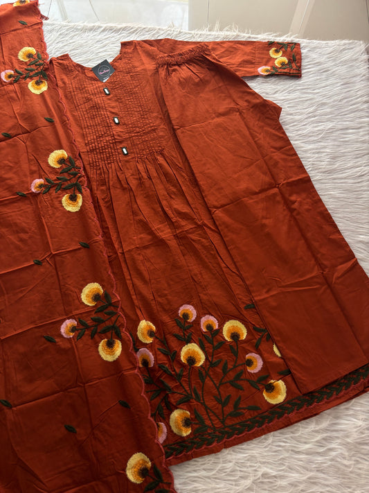 MD-257 That is a lovely three-piece ethnic set in a rich plum or deep mauve shade. Here is a breakdown of the details for your caption: