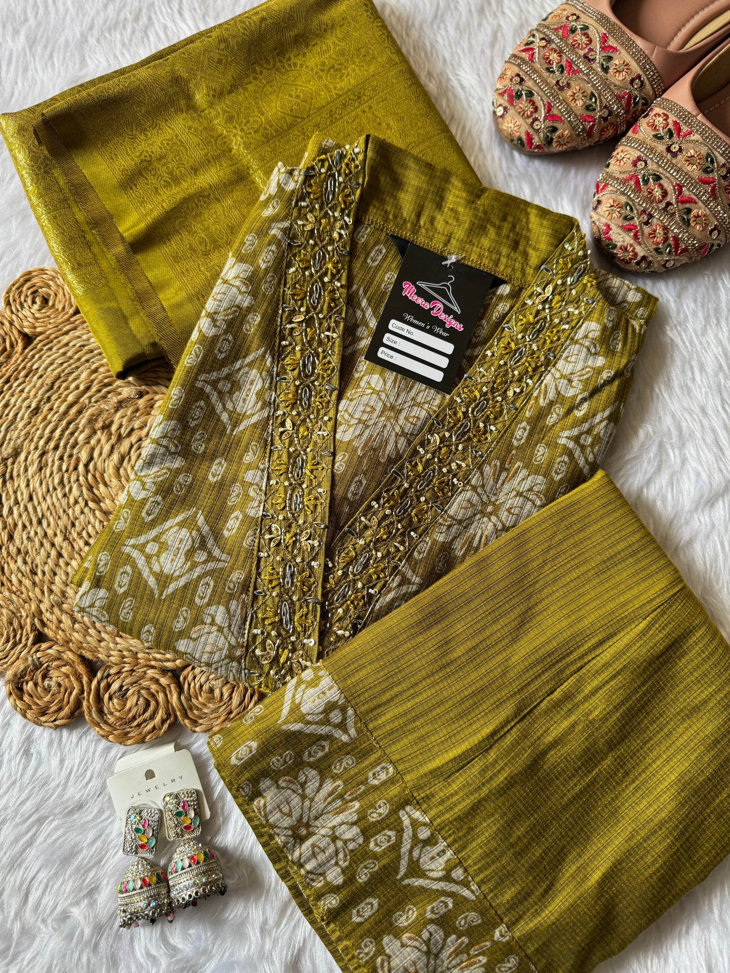MD-171 "Regal Rose Banarasi Ensemble"

This elegant design features a rich magenta kurta adorned with intricate golden motifs, paired with a matching pleated bottom and a luxurious silk dupatta — perfect for festive elegance and timeless tradition.