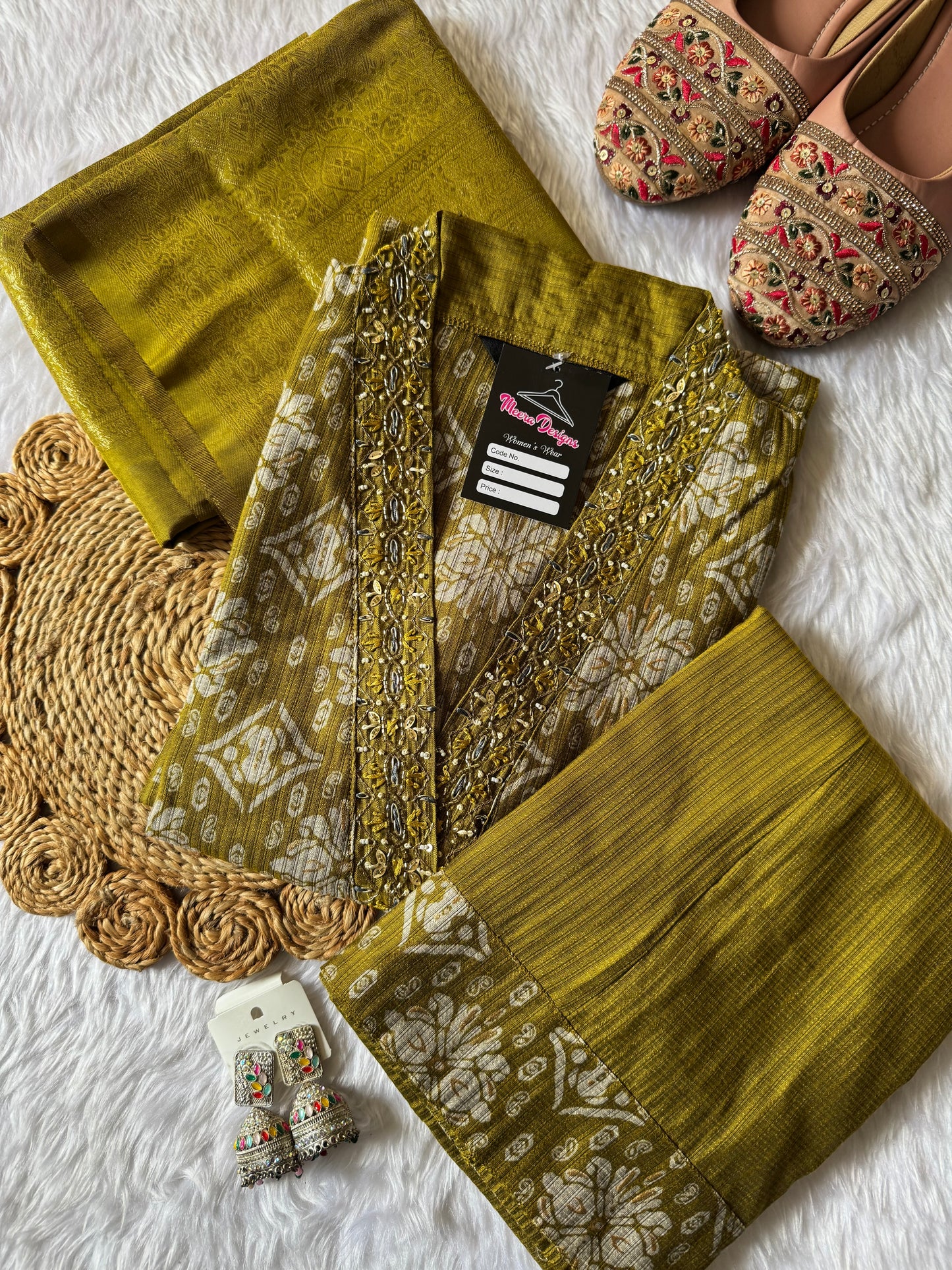MD-171 "Regal Rose Banarasi Ensemble"

This elegant design features a rich magenta kurta adorned with intricate golden motifs, paired with a matching pleated bottom and a luxurious silk dupatta — perfect for festive elegance and timeless tradition.