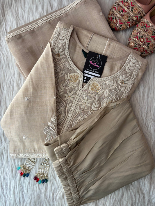 MD-256 That is a stunning ensemble! It has a very refined, "understated luxury" vibe. Here is a caption you could use for it