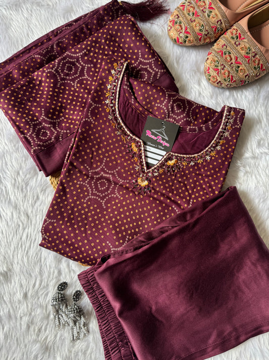 MD-179 This deep Wine Bandhani suit set blends traditional patterns with subtle embellishments, perfect for a timeless ethnic charm."