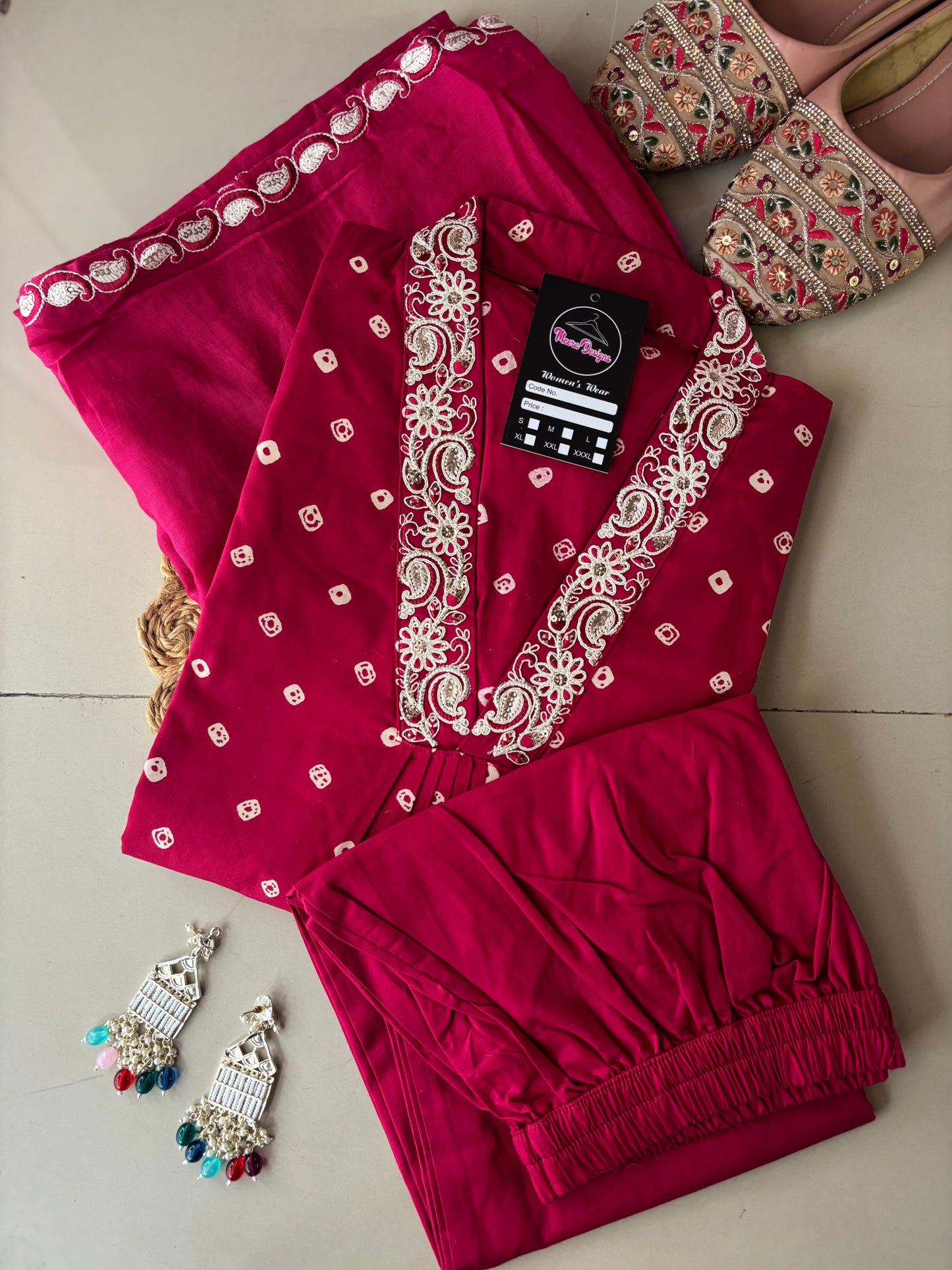 MD-254 That deep magenta shade is stunning, especially with the classic Bandhani print. Here are a few caption options for your post, ranging from descriptive to poetic