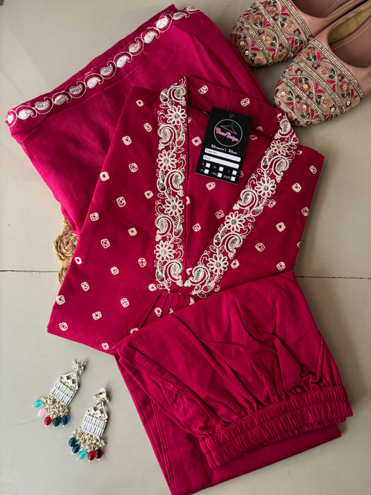 MD-254 That deep magenta shade is stunning, especially with the classic Bandhani print. Here are a few caption options for your post, ranging from descriptive to poetic