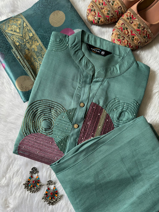 MD-186 This pastel green kurta set with abstract embroidery and a vibrant dupatta blends modern charm with traditional finesse — perfect for your effortless everyday style!