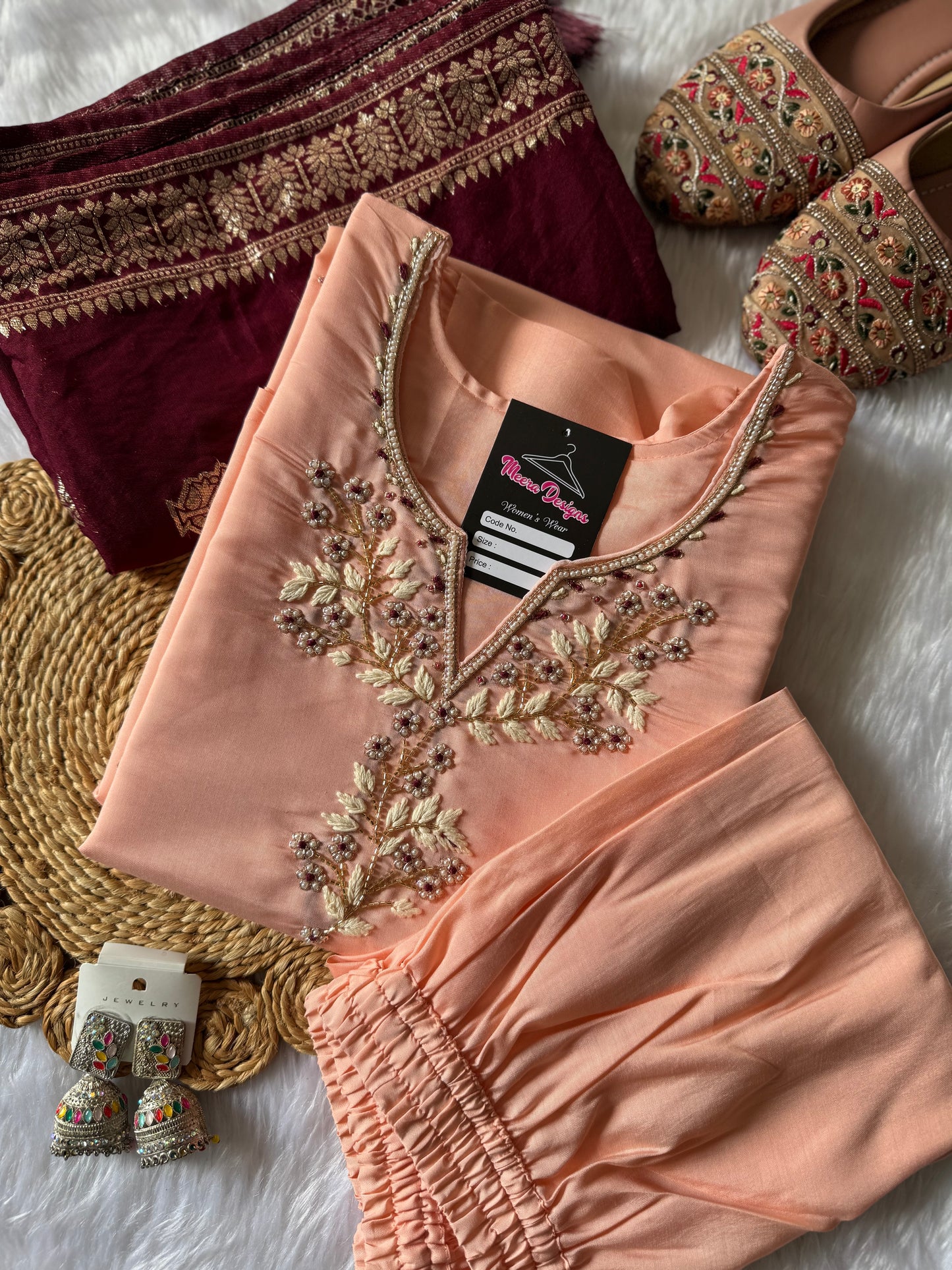 MD-175 Peach elegance meets royal charm ✨
A beautifully embroidered kurta paired with a rich maroon dupatta—perfect for festive grace and timeless style.