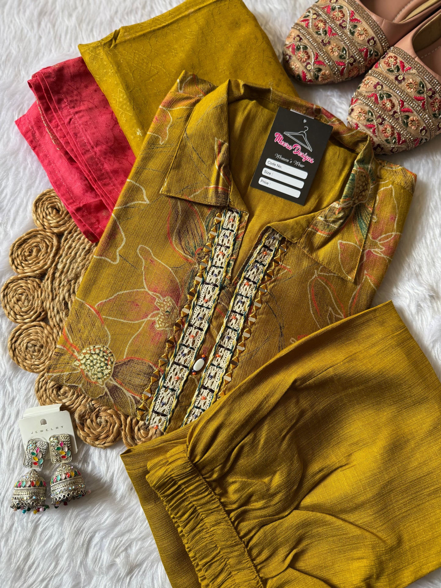 MD-173 Radiate elegance with this mustard floral kurta set, adorned with delicate embroidery and paired with a vibrant dual-tone dupatta. Perfect for festive days or graceful gatherings! ✨💛💗