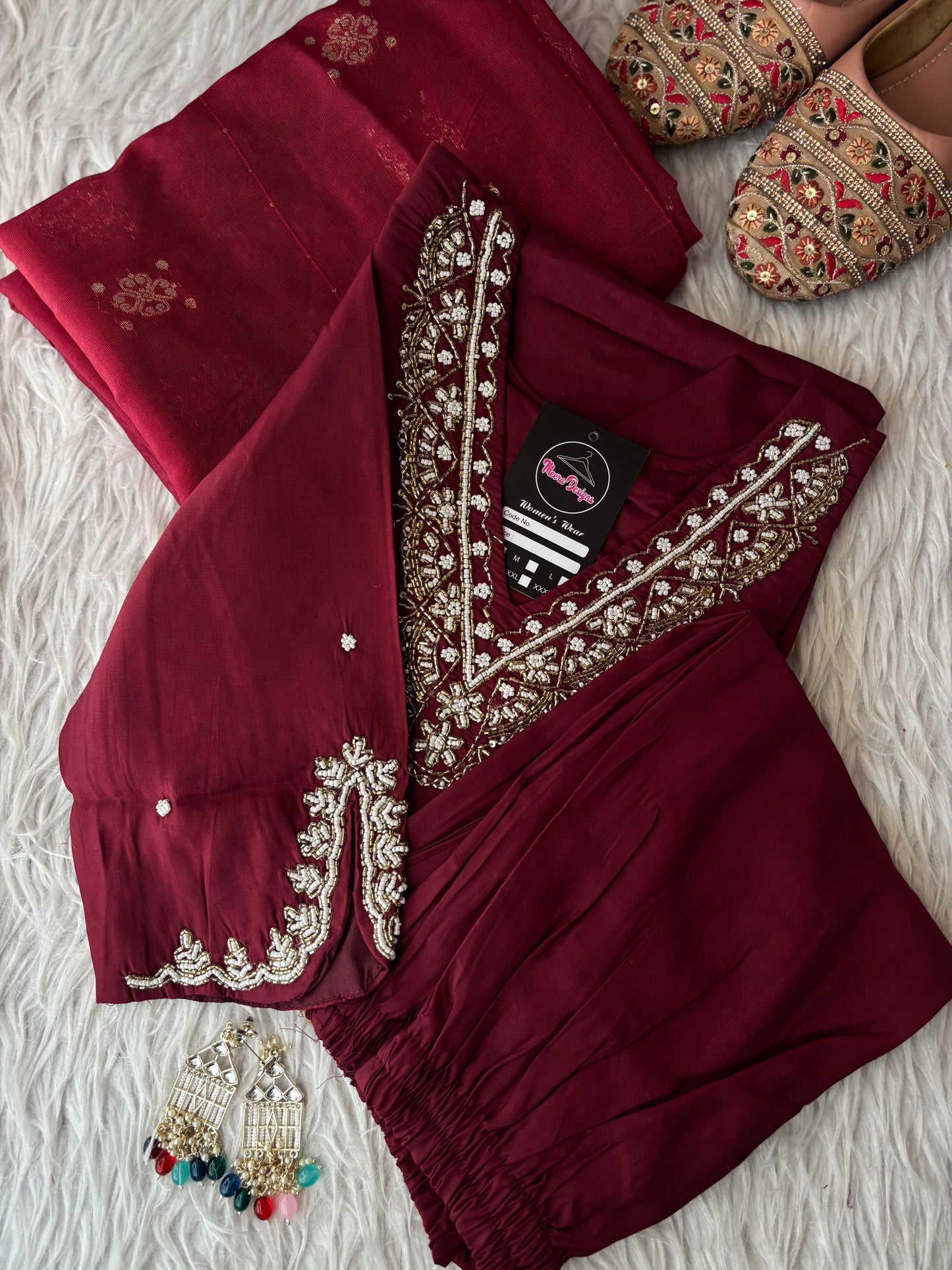 MD-263 The mauve hue of this ethnic set is absolutely stunning! The intricate embroidery on the neckline and sleeves gives it such a sophisticated look. Here are a few caption options for your post, ranging from elegant to more casual