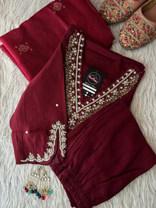 MD-263 The mauve hue of this ethnic set is absolutely stunning! The intricate embroidery on the neckline and sleeves gives it such a sophisticated look. Here are a few caption options for your post, ranging from elegant to more casual