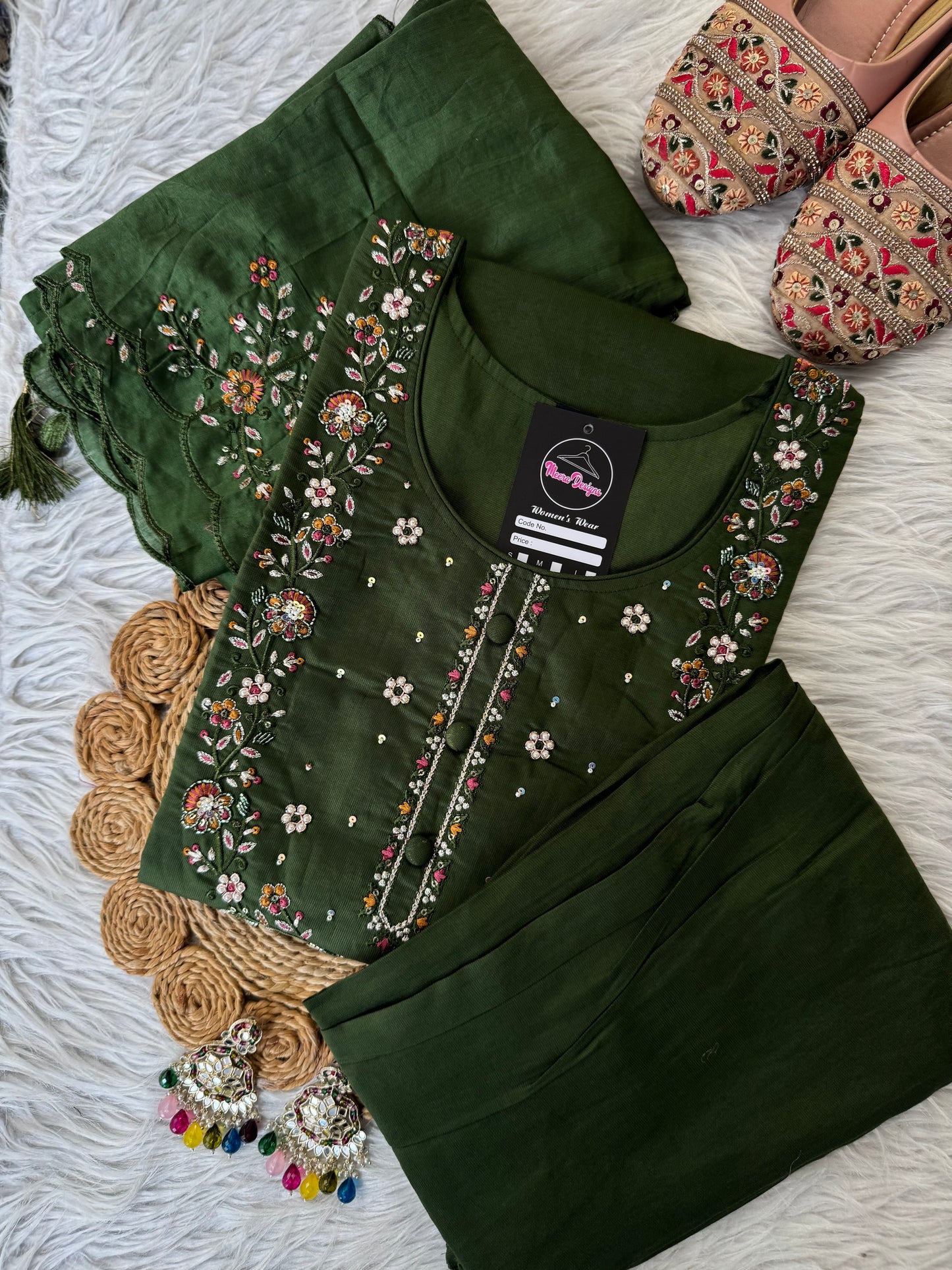MD-209 "Elegance in every detail ✨ This deep purple suit with delicate floral embroidery is a perfect blend of grace and tradition 🌸💜"
Would you like me to give you a few more short caption options to choose from?