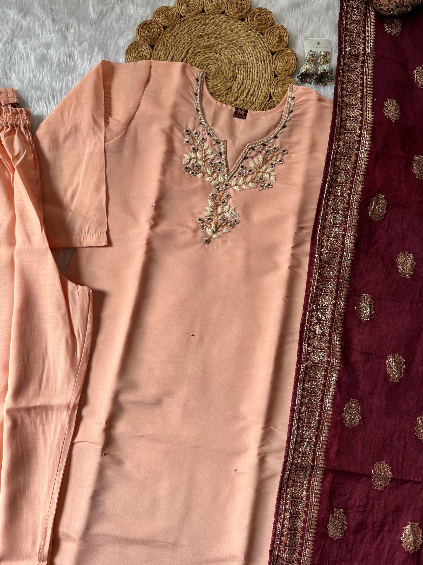 MD-175 Peach elegance meets royal charm ✨
A beautifully embroidered kurta paired with a rich maroon dupatta—perfect for festive grace and timeless style.