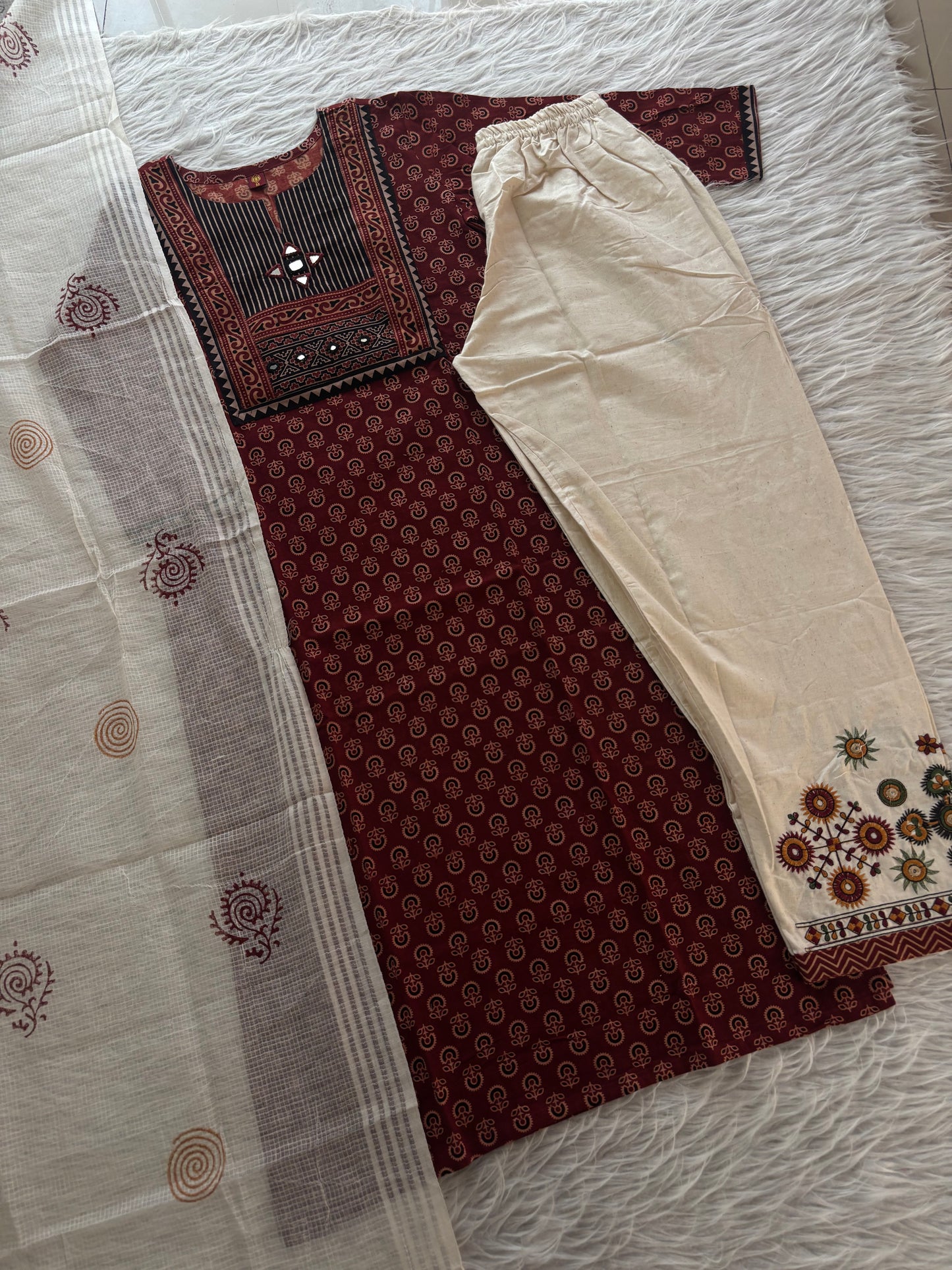 MD-268 "Effortless elegance in every stitch. ✨ This Ajrakh-inspired print kurta paired with classic cream trousers and a matching dupatta is the perfect blend of tradition and comfort. Ideal for office wear or a casual day out! 🌸"