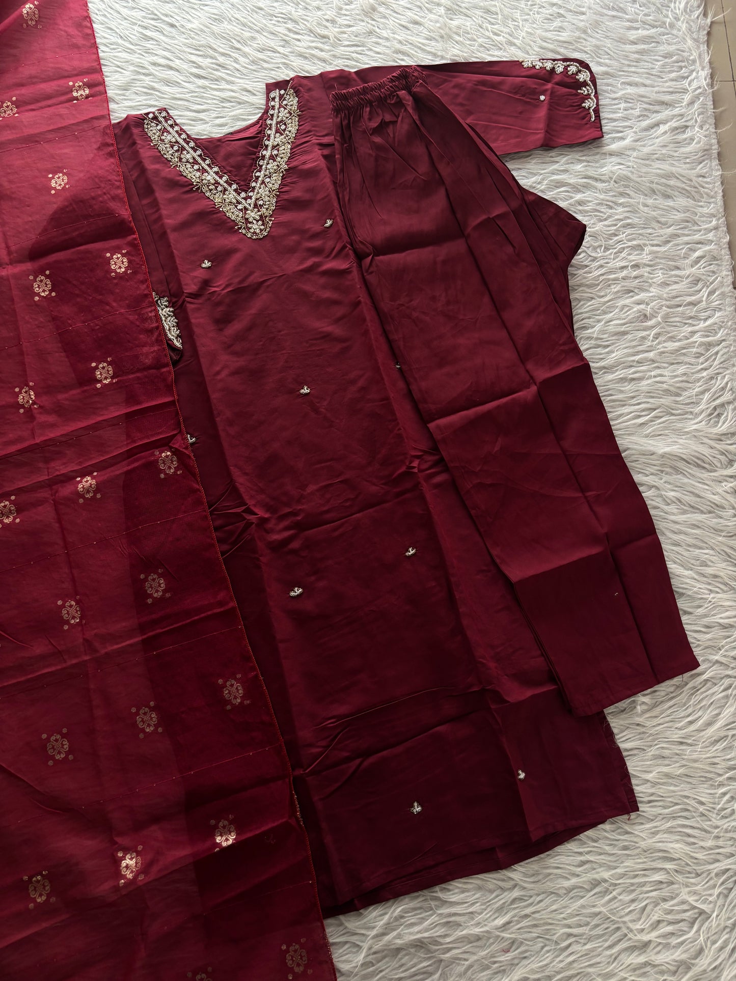 MD-263 The mauve hue of this ethnic set is absolutely stunning! The intricate embroidery on the neckline and sleeves gives it such a sophisticated look. Here are a few caption options for your post, ranging from elegant to more casual