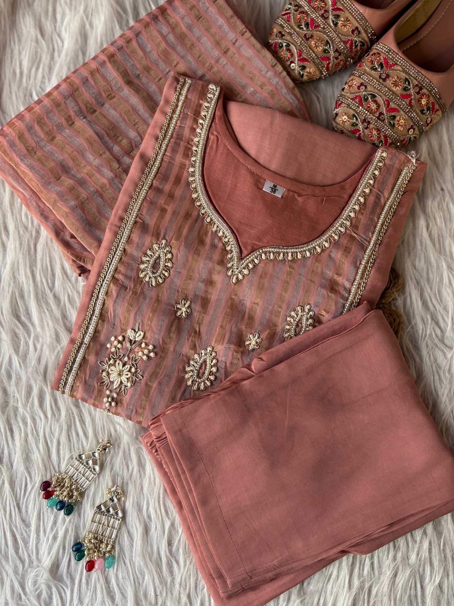 MD-228 That is a lovely choice! This ethnic set has a very sophisticated, calming vibe. Depending on where you’re posting this, here are a few caption options for you: