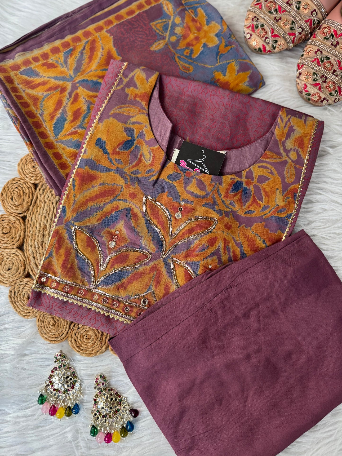 MD-191 Elegant in every thread — this teal ethnic suit set features intricate velvet patchwork with floral motifs, paired with a beautifully woven dupatta that blends tradition with timeless grace. 🌿✨