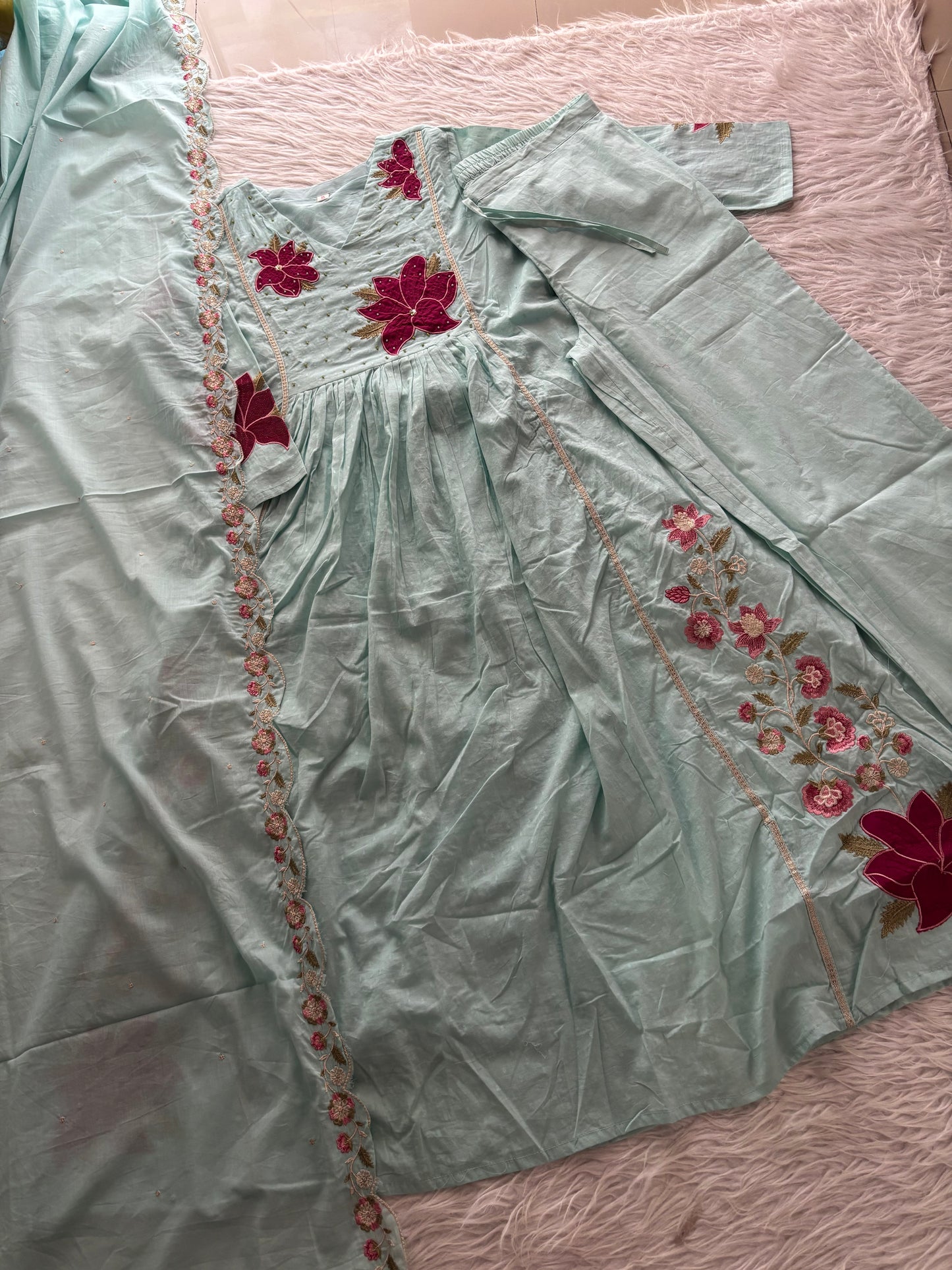MD-221 ethnic ensemble is the definition of "effortless elegance." Whether you're heading to a festive gathering or a casual brunch, this set strikes the perfect balance between traditional charm and modern comfort.