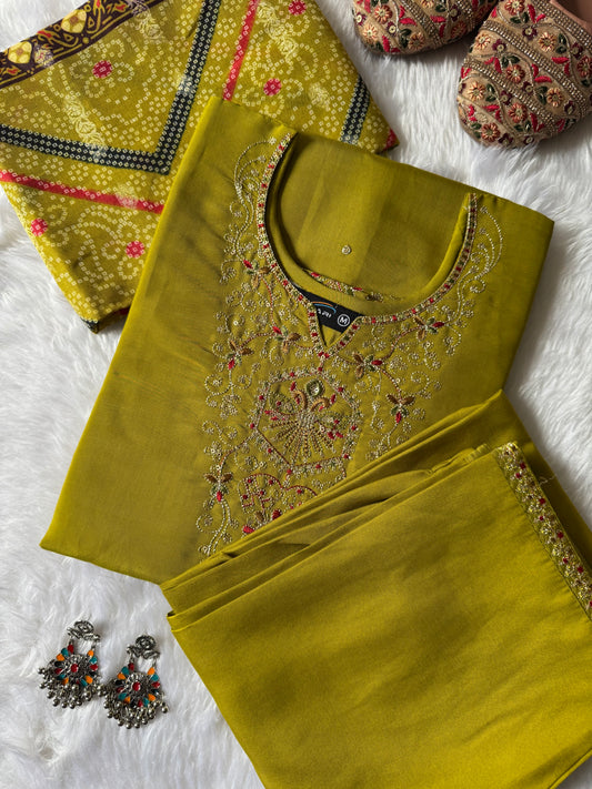 MD-187 this mustard green suit set features intricate neckline embroidery paired with a rich Banarasi dupatta, making it an exquisite choice for festive occasions and celebrations. ✨💛
