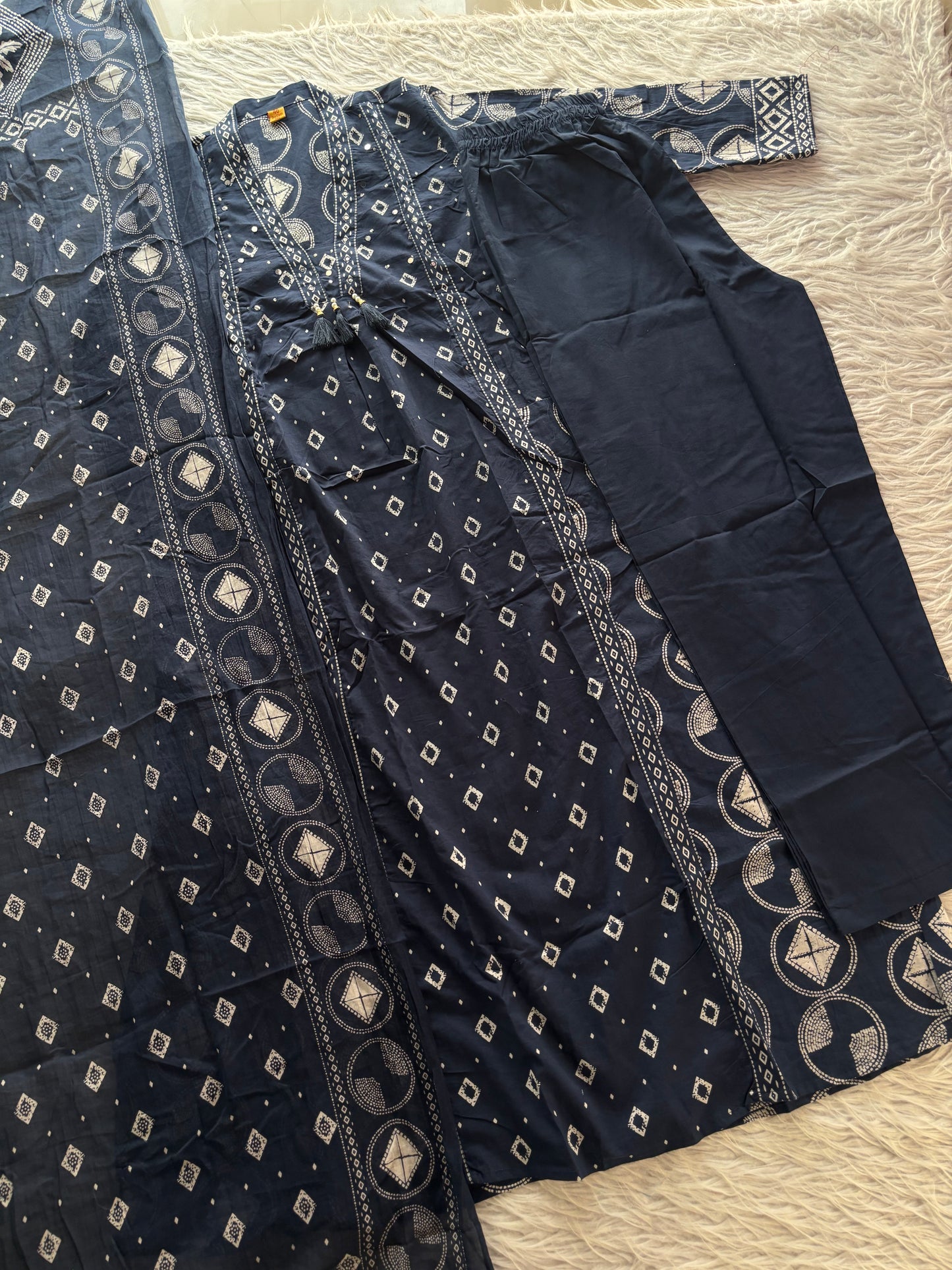 MD-267 Captions for Your Berry  Bandhani Set
Here are a few caption options tailored for different social media vibes, highlighting the intricate mirror work and classic Bandhani print of this outfit.