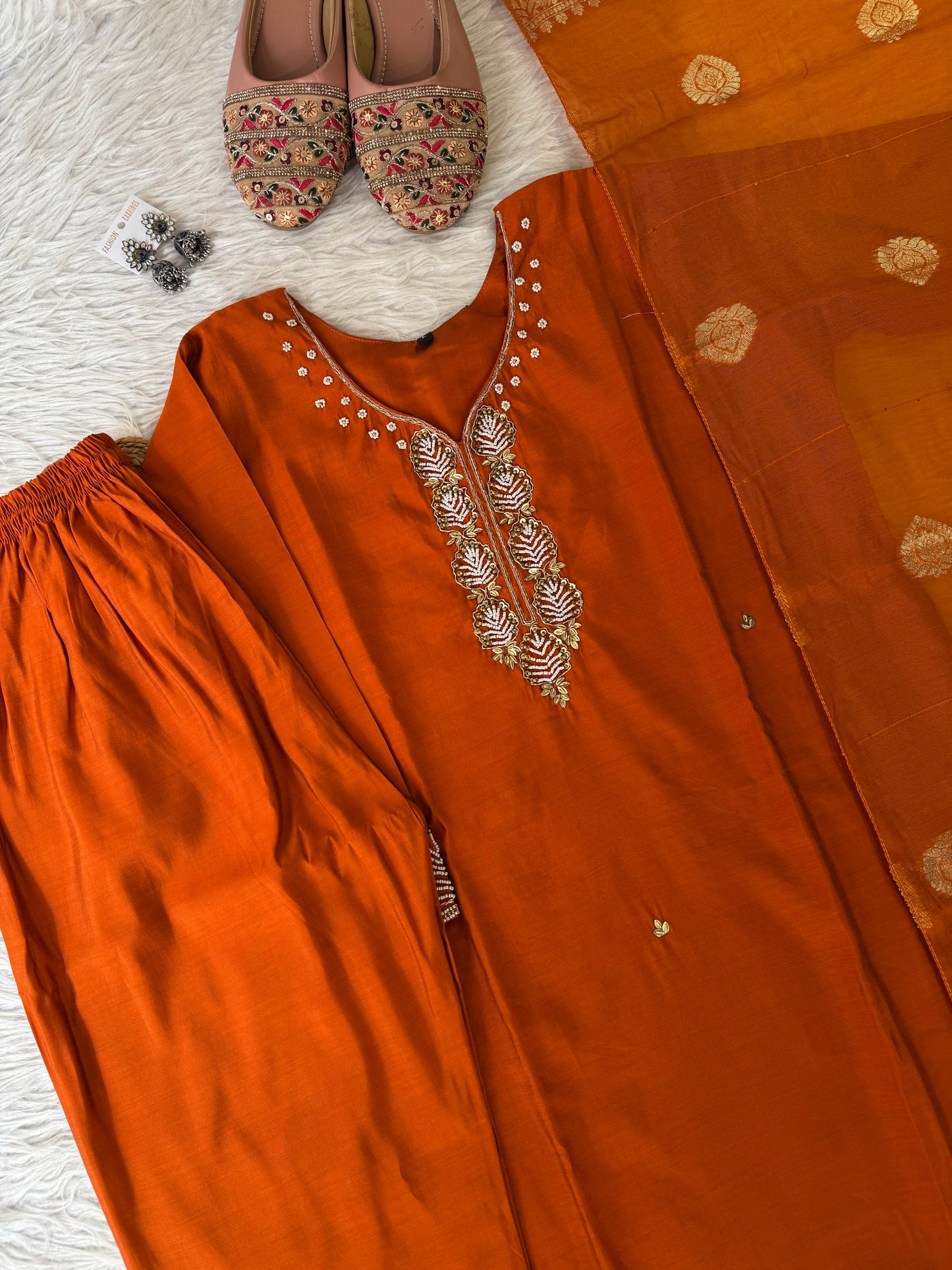 MD-210 Elegance in every thread 🌿✨
This rust-orange set with delicate embroidery and a touch of tradition is perfect for festive charm and everyday grace. Pair it with juttis and silver jewels for that timeless ethnic vibe. 🧡
#FestiveStyle #EthnicElegan