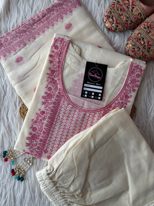 MD-259 "Timeless elegance in every thread. ✨ Embracing the beauty of traditional craftsmanship with this stunning cream and pink ensemble. Perfect for those special moments that deserve a touch of grace."