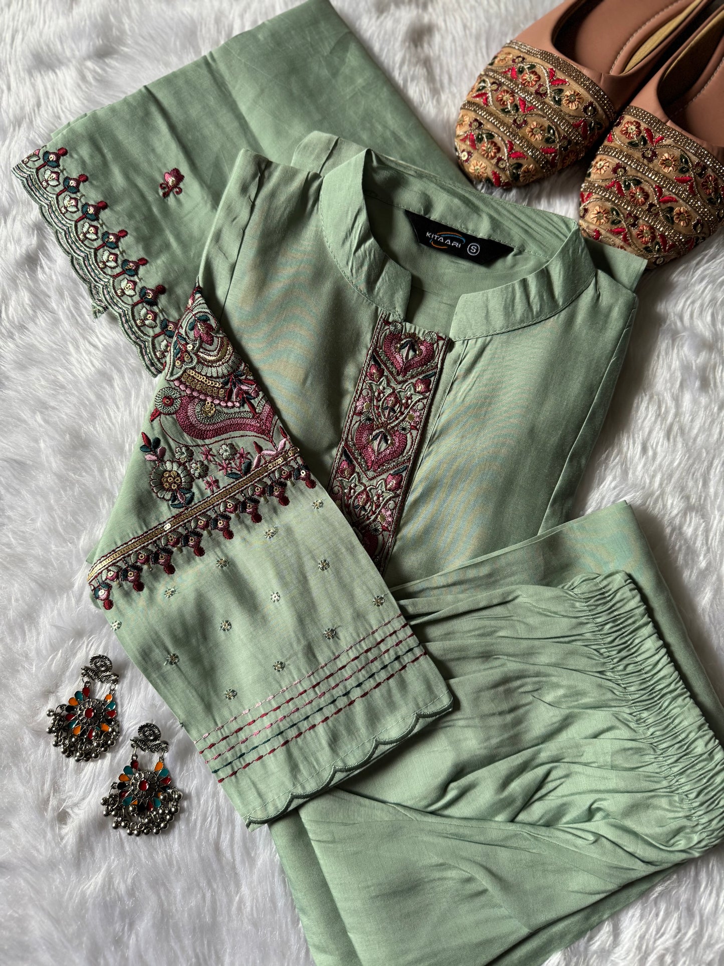 MD-188 A soft kurta set adorned with intricate thread embroidery and a delicately detailed dupatta. Perfect for effortless elegance in every season. ✨