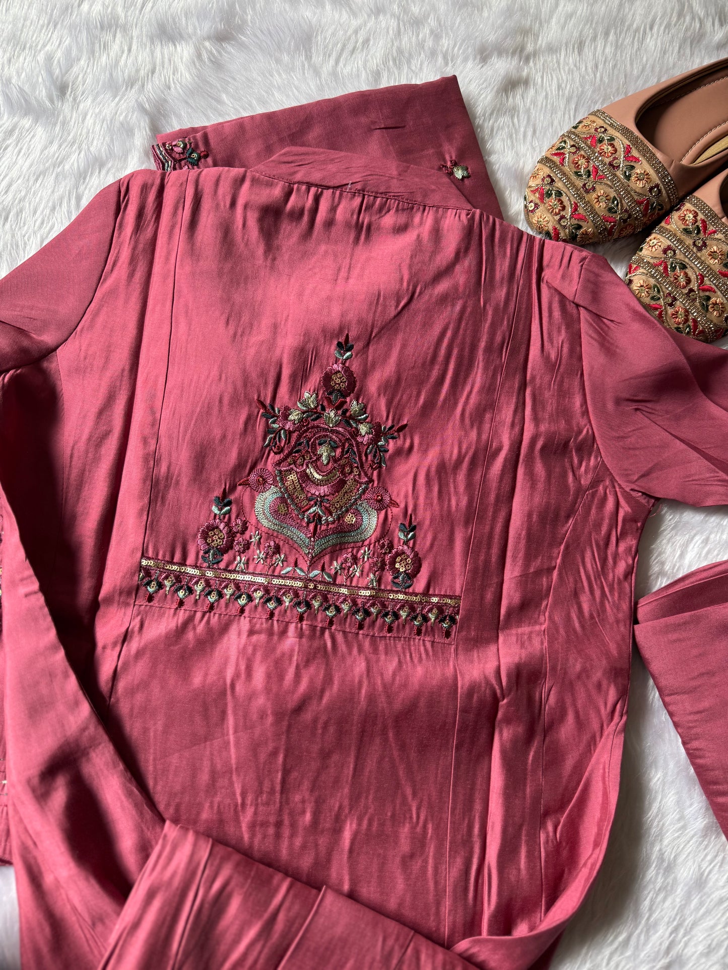 MD-188 A soft kurta set adorned with intricate thread embroidery and a delicately detailed dupatta. Perfect for effortless elegance in every season. ✨