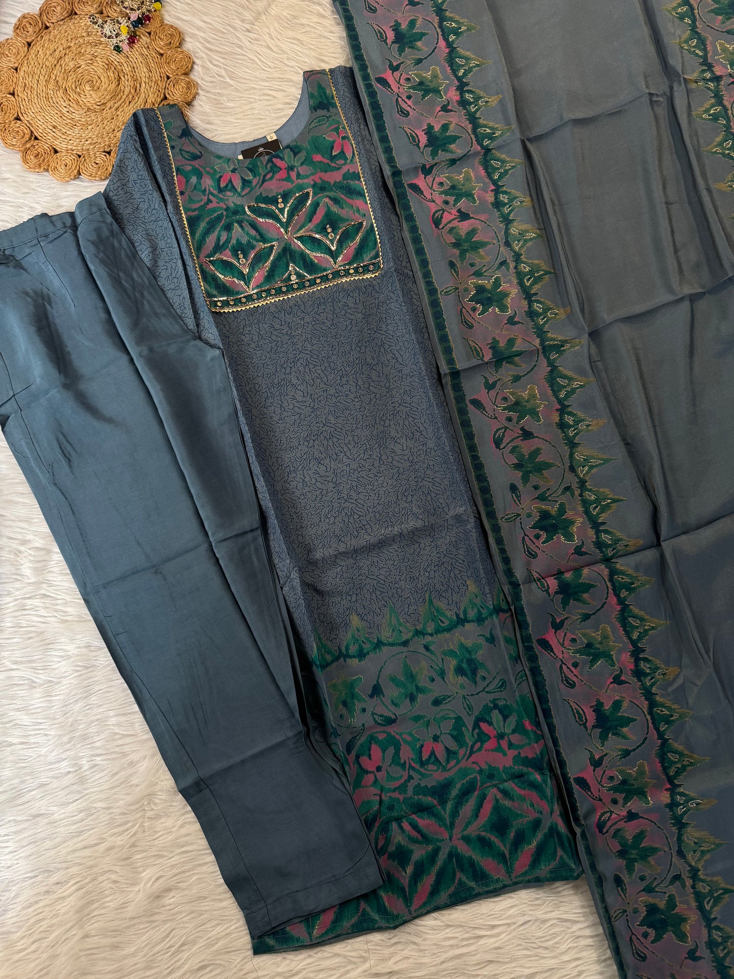 MD-191 Elegant in every thread — this teal ethnic suit set features intricate velvet patchwork with floral motifs, paired with a beautifully woven dupatta that blends tradition with timeless grace. 🌿✨