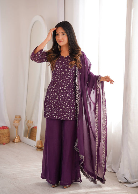 MD-264 That is a stunning ensemble! The grape hue is incredibly regal. Here are a few caption options depending on the vibe you want for your post: