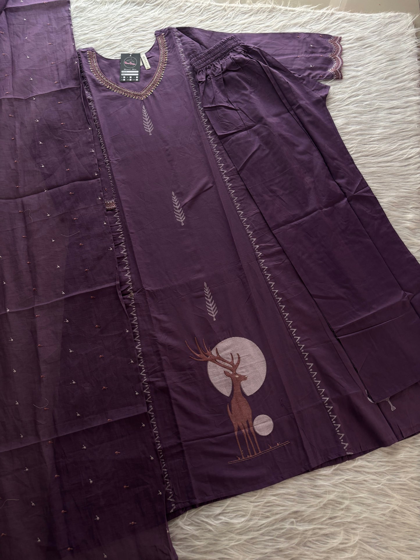 MD-261 That is a beautiful deep plum or grape-colored three-piece ethnic set. Here is a breakdown of the outfit and a few caption ideas depending on the vibe you want to set.