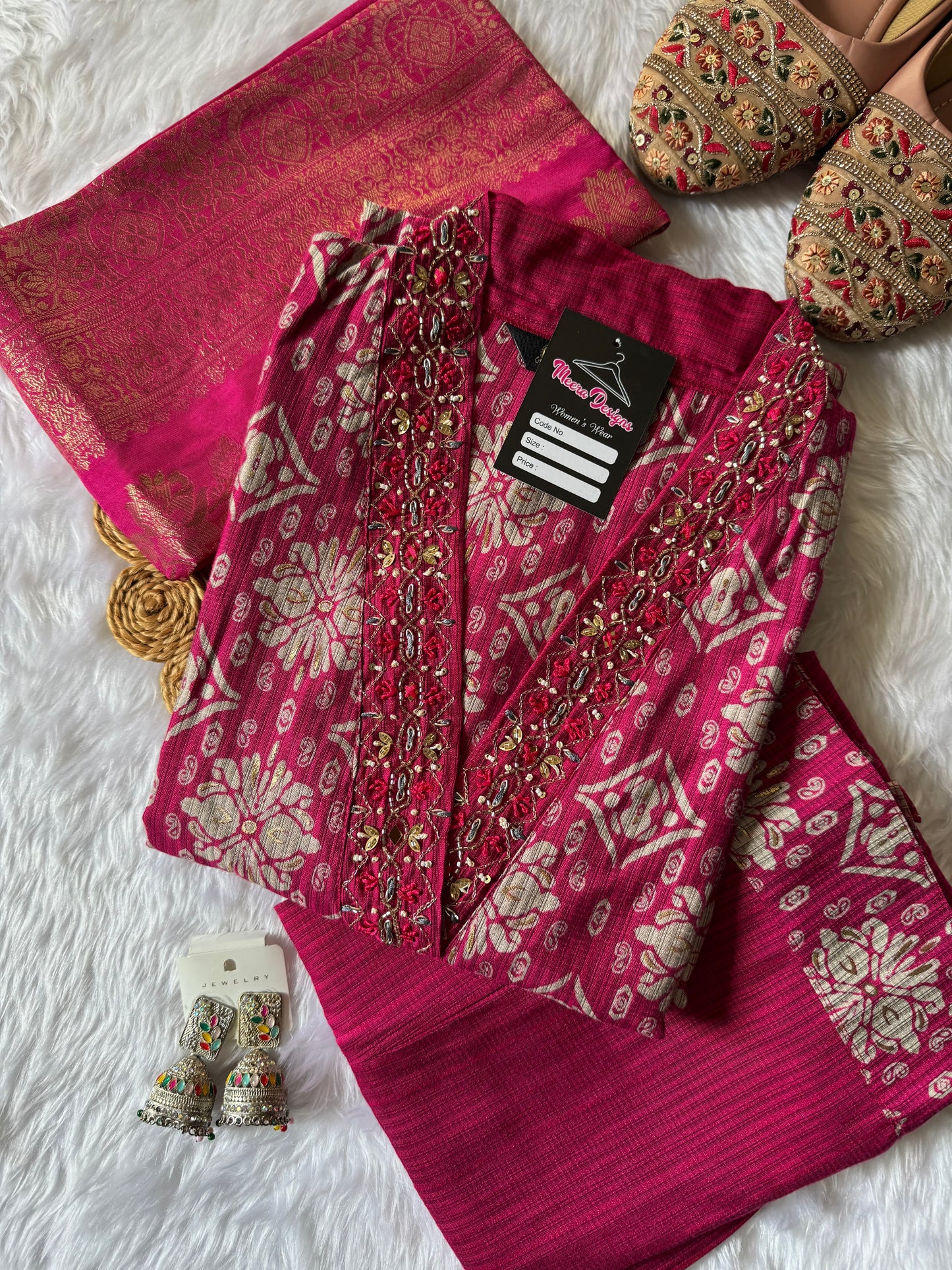 MD-171 "Regal Rose Banarasi Ensemble"

This elegant design features a rich magenta kurta adorned with intricate golden motifs, paired with a matching pleated bottom and a luxurious silk dupatta — perfect for festive elegance and timeless tradition.