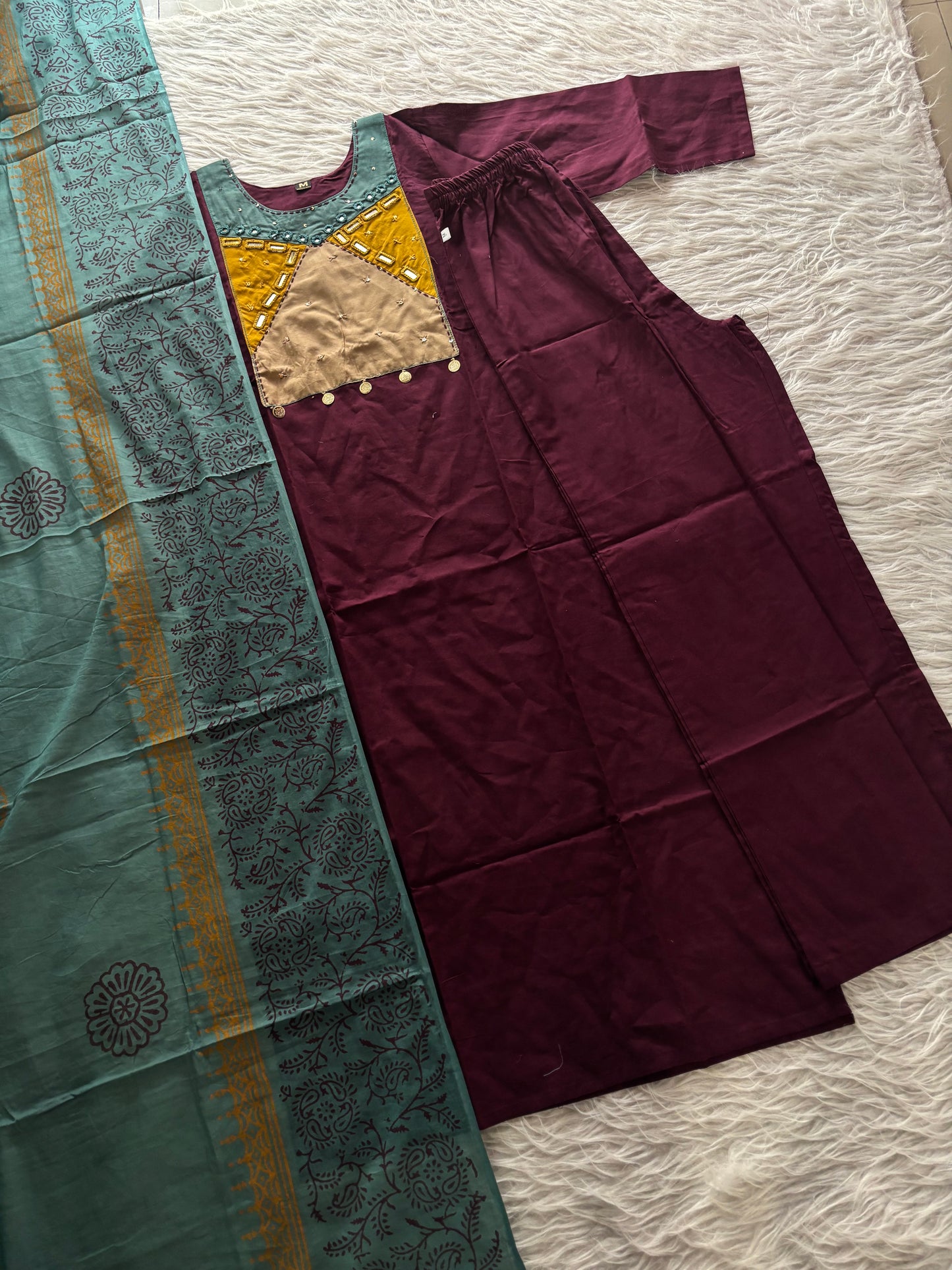 MD-229 That is a beautiful ethnic set! Here are a few caption options for your article or social media post, ranging from elegant to trendy: