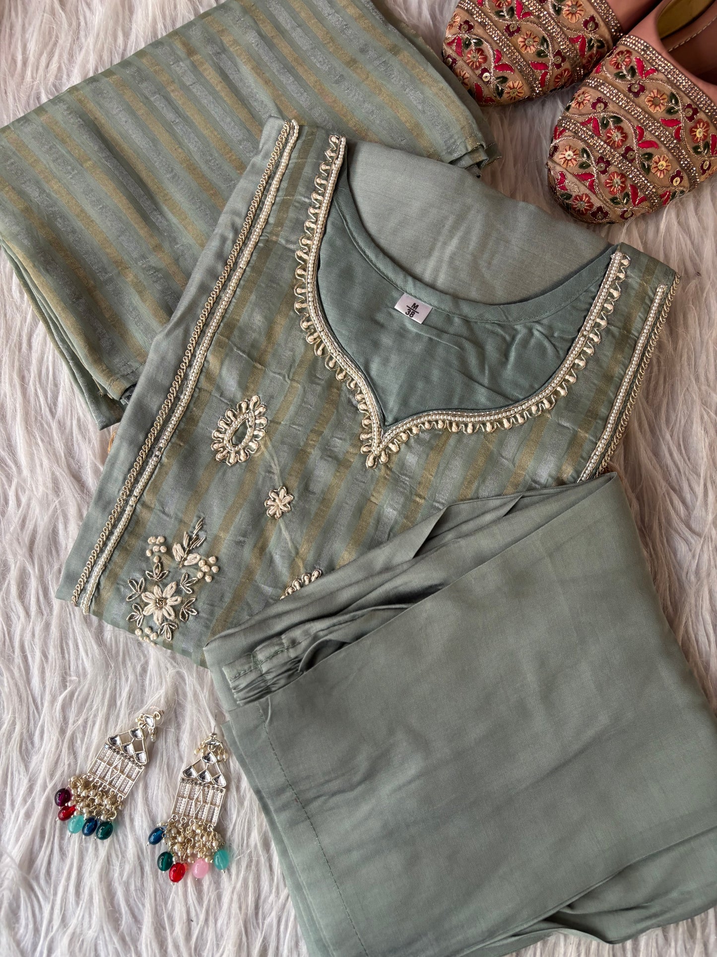 MD-228 That is a lovely choice! This ethnic set has a very sophisticated, calming vibe. Depending on where you’re posting this, here are a few caption options for you: