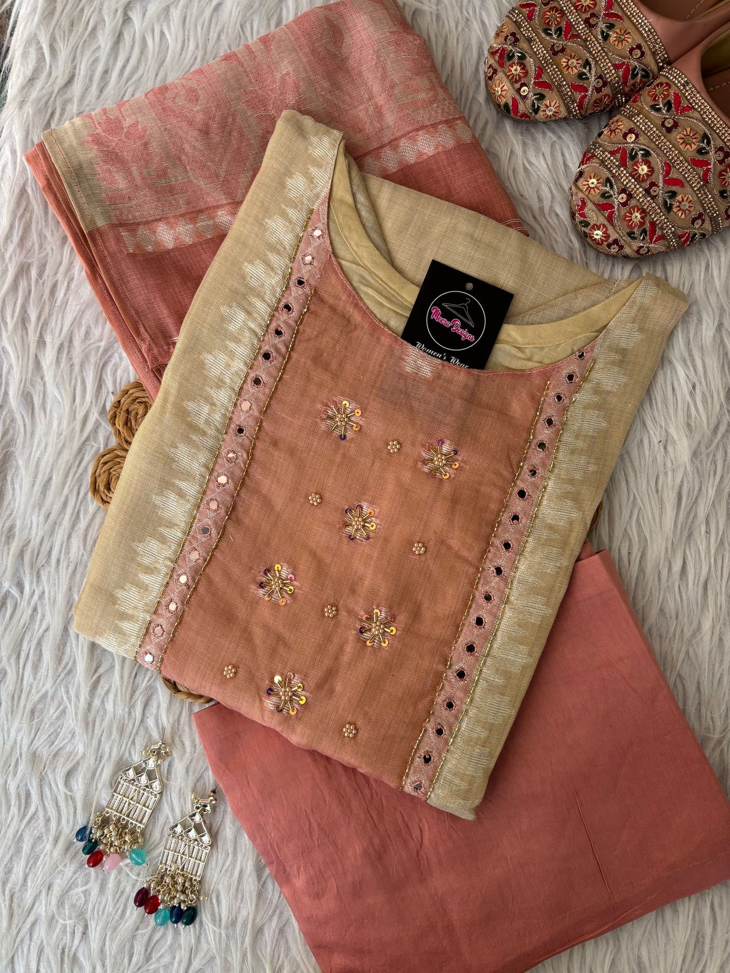 MD-266 This is a beautiful, understated three-piece Salwar Kameez set that perfectly balances traditional elegance with a modern, earthy color palette. It’s a great choice for semi-formal gatherings or festive daytime events.