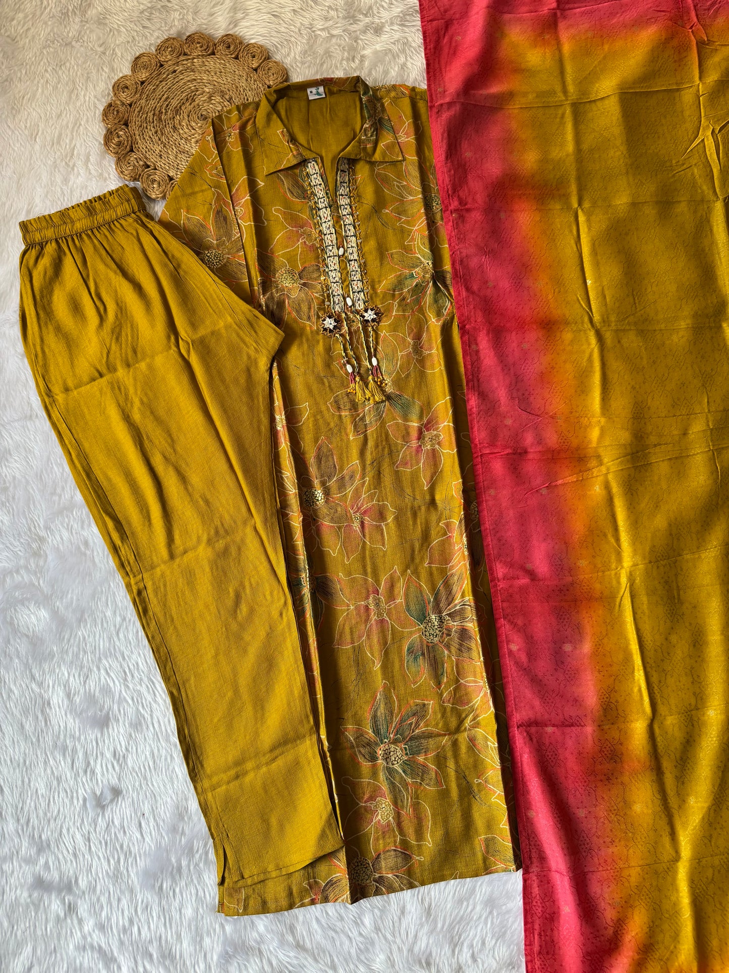 MD-173 Radiate elegance with this mustard floral kurta set, adorned with delicate embroidery and paired with a vibrant dual-tone dupatta. Perfect for festive days or graceful gatherings! ✨💛💗
