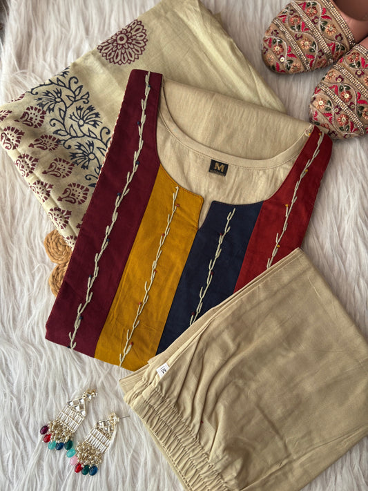 MD-231 This stylish three-piece ethnic set offers a blend of neutral tones and vibrant accents, making it a versatile choice for both casual outings and festive gatherings.
