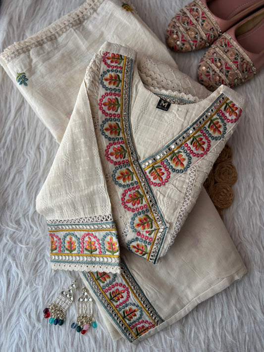 MD-248 Elegant Ethnic Ensembles
Here are a few caption options for this ivory suit set, ranging from classic to trendy: