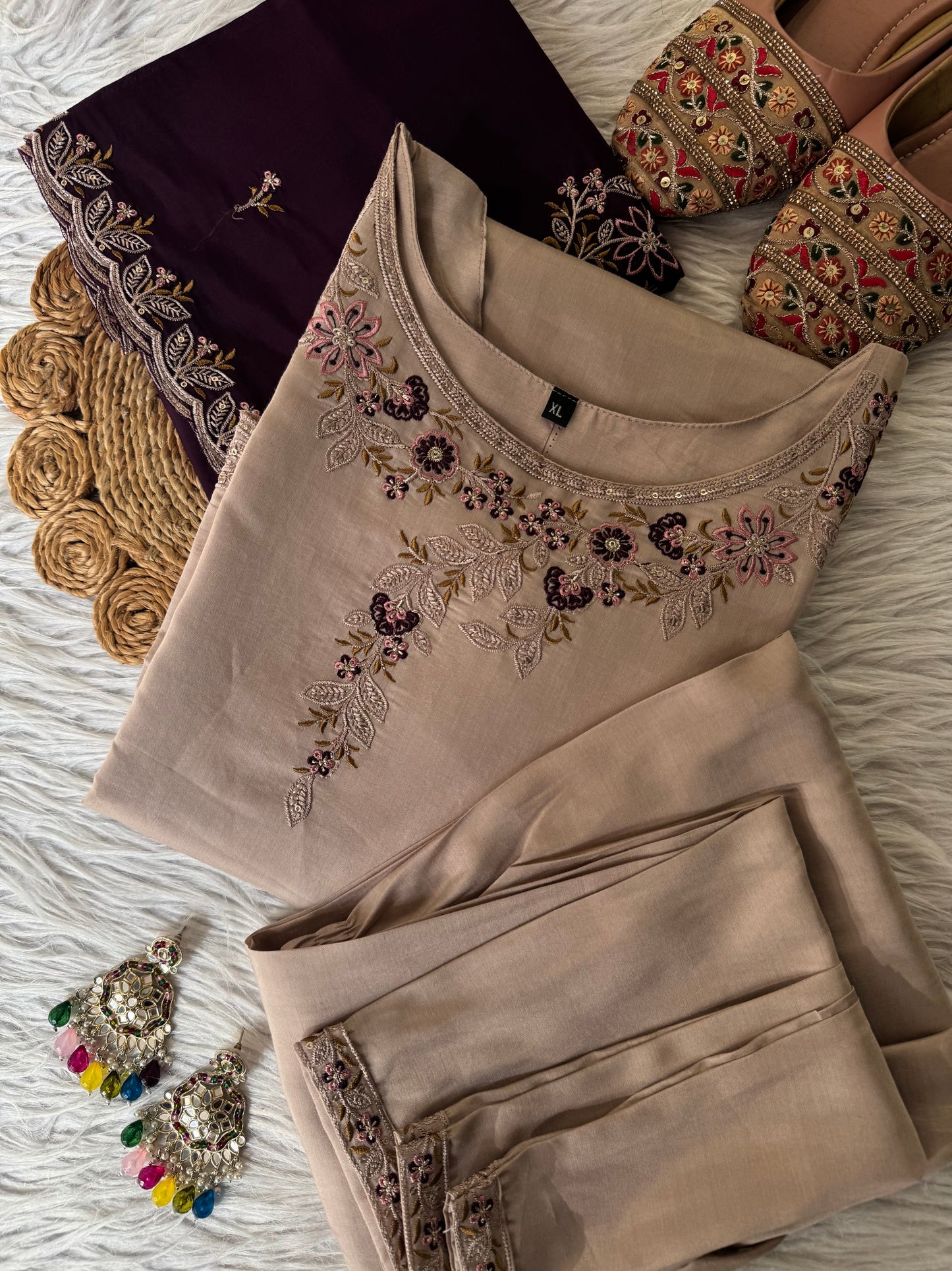 MD-214 Royal elegance in every stitch – deep plum adorned with delicate floral embroidery for a timeless festive charm."