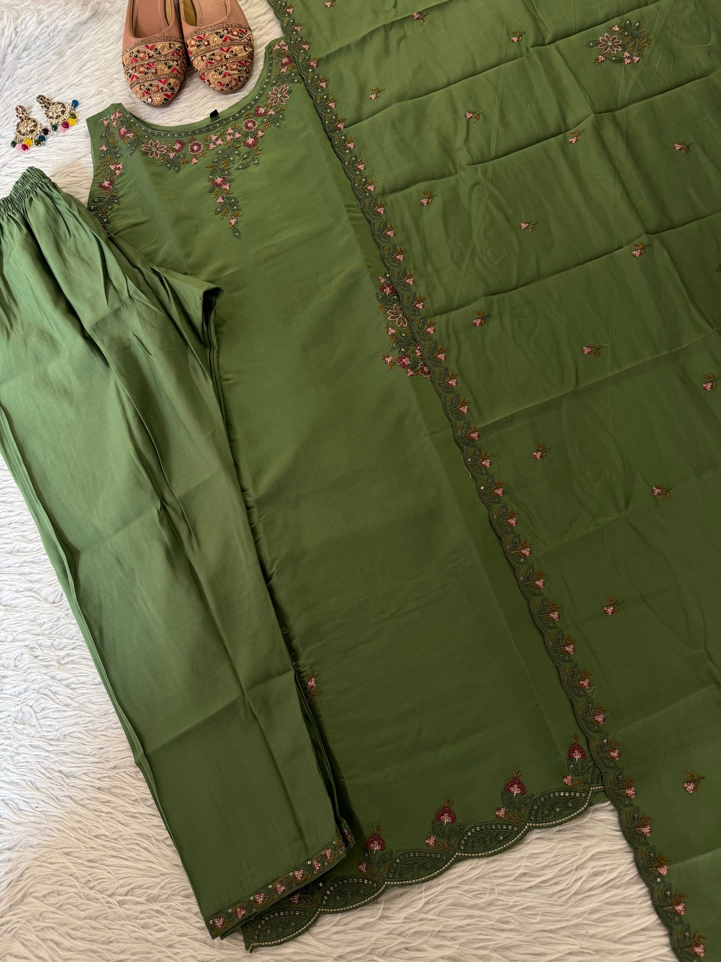 MD-214 Royal elegance in every stitch – deep plum adorned with delicate floral embroidery for a timeless festive charm."