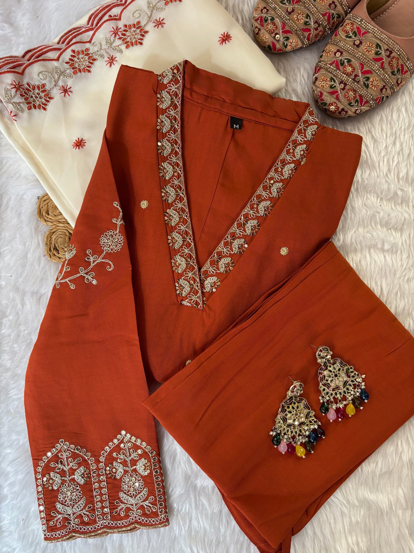 MD-213 "Elegance in every detail with embroidary work ✨ This deep purple suit with delicate floral embroidery is a perfect blend of grace and tradition